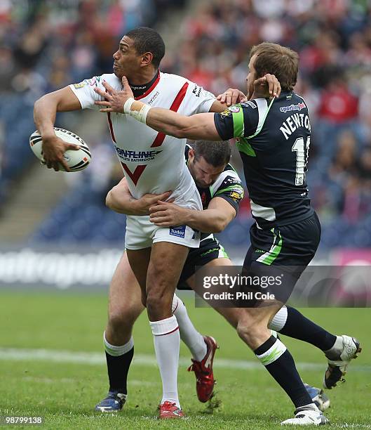 Leon Pryce of St Helens gets tackled by of Clint Newton and Joel Clinton Hull Kingston Rovers during the Engage Rugby Super League Magic Weekend...