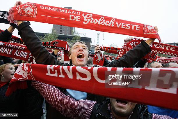 Fans of the Dutch football team FC Twente celebrate after FC Twente defeated Breda 2-0 and became the new Dutch champion, on May 2 in Enschede. AFP...