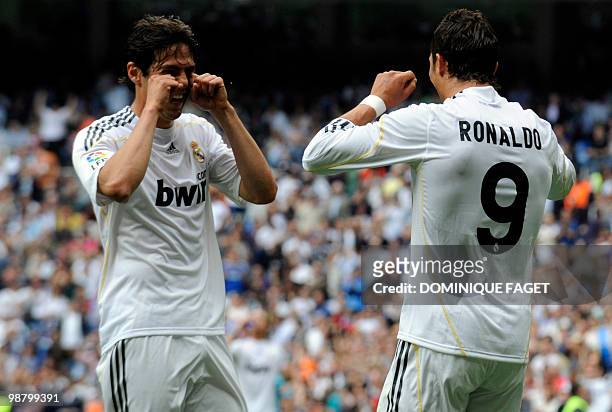 Real Madrid's Portuguese forward Cristiano Ronaldo (R celebrates with Real Madrid's Brazilian midfielder Kaka after scoring during the Spanish league...