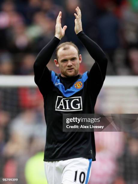 Wayne Rooney of Manchester United applauds the supporters after the Barclays Premier League match between Sunderland and Manchester United at the...