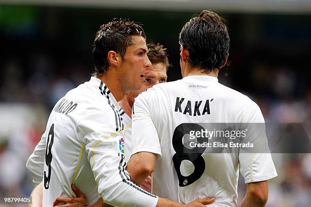Cristiano Ronaldo of Real Madrid celebrates with Kaka during the La Liga match between Real Madrid and CA Osasuna at Estadio Santiago Bernabeu on May...