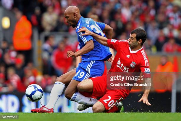 Nicolas Anelka of Chelsea is tackled by Javier Mascherano of Liverpool during the Barclays Premier League match between Liverpool and Chelsea at...