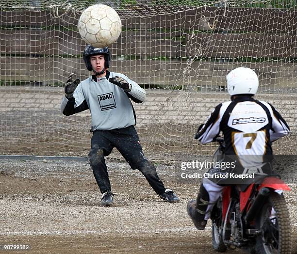 Phil Stolte of MSC Seelze saves a shot of Andreas Muermann of MBC Kierspe during the Motoball match between MBC Kierspe and MSC Seelze at the...