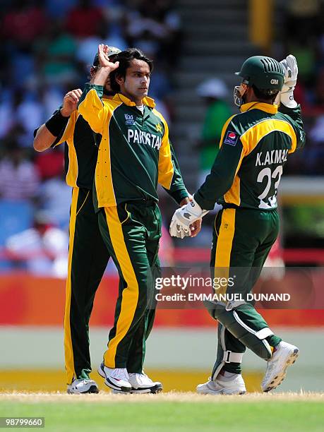 Pakistani bowler Mohammad Hafeez celebrates after taking the wicket of Australian batsman Michael Clarke during The ICC World Twenty20 Group A match...