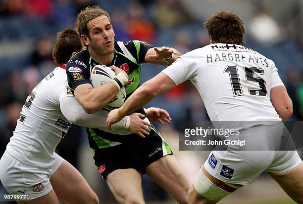 Chaz I'Anson of Hull Kingston Rovers is held up during the Engage Super League game between St.Helens and Hull Kingston Rovers at Murrayfield on May...