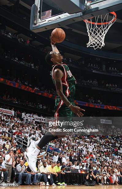 Brandon Jennings of the Milwaukee Bucks dunks against the Atlanta Hawks in Game Seven of the Eastern Conference Quarterfinals during the 2010 NBA...