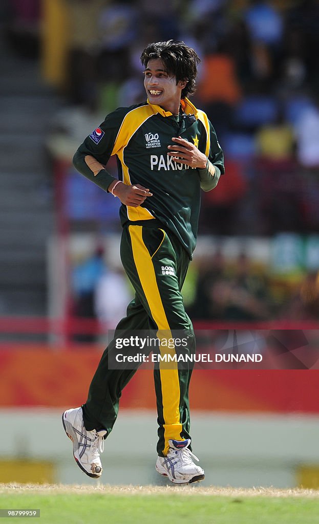 Pakistani bowler Mohammad Aamer celebrat