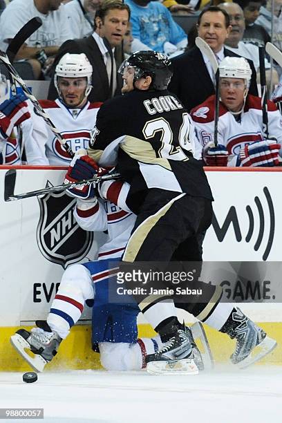 Matt Cooke of the Pittsburgh Penguins checks Brian Gionta of the Montreal Canadiens off the puck in Game Two of the Eastern Conference Semifinals...