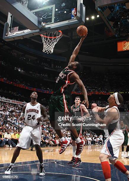 Luc Richard Mbah a Moute of the Milwaukee Bucks dunks against the Atlanta Hawks in Game Seven of the Eastern Conference Quarterfinals during the 2010...