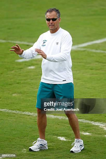 Defensive coordinator Mike Nolan of the Miami Dolphins demonstrates proper blocking techniques during the rookie mini camp May 2, 2010 at the Miami...