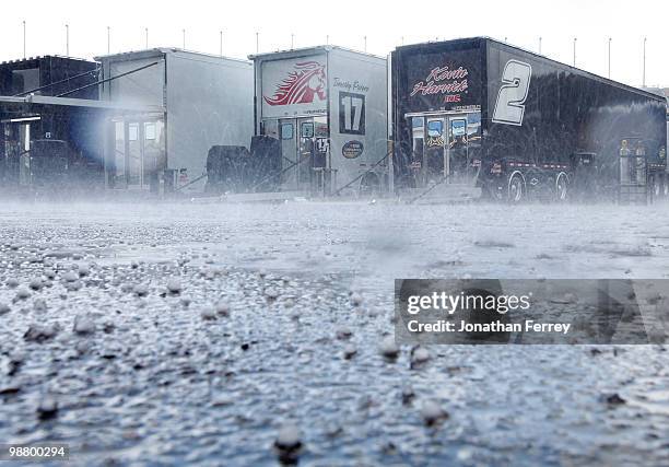 Rain and hail falls in the garage causing a delay during for the NASCAR Camping World Truck Series O'Reilly Auto Parts 250 on May 2, 2010 at Kansas...