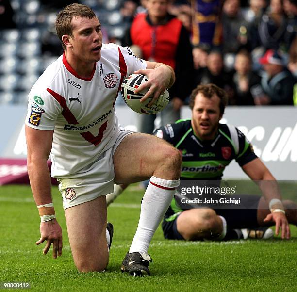 Matty Ashurst of St Helens scores a try during the Engage Rugby Super League Magic Weekend match between St Helens and Hull Kingston Rovers at...