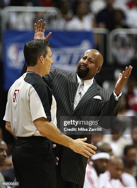 Atlanta Hawks head coach Mike Woodson argues with referee Greg Willard during Game Seven of the Eastern Conference Quarterfinals between the...