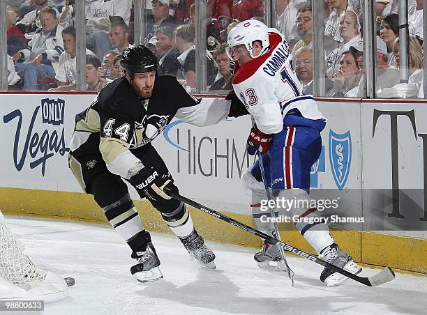 Brooks Orpik of the Pittsburgh Penguins battles for the puck against Michael Cammalleri of the Montreal Canadiens in Game Two of the Eastern...