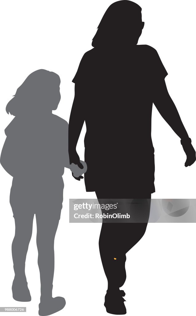 Femme marchant main dans la main avec la Silhouette de jeune fille