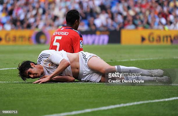 Kaka of Real Madrid takes a fall during the La Liga match between Real Madrid and CA Osasuna at Estadio Santiago Bernabeu on May 2, 2010 in Madrid,...