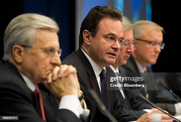 Left to right, Jean-Claude Trichet, president of the European Central Bank , sits with George Papaconstantinou, Greece's finance minister,...