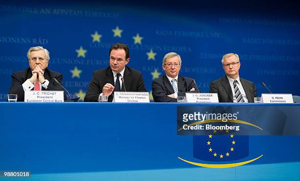 Left to right, Jean-Claude Trichet, president of the European Central Bank , sits with George Papaconstantinou, Greece's finance minister,...