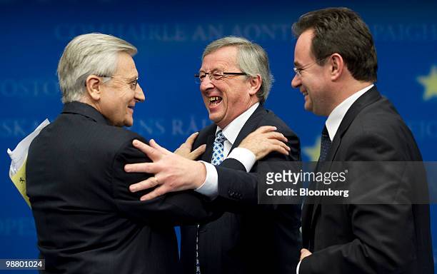 Jean-Claude Trichet, president of the European Central Bank , left, Jean-Claude Juncker, Luxembourg's prime minister and president of the Eurogroup,...