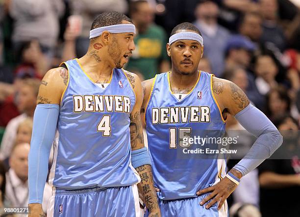 Kenyon Martin of the Denver Nuggets speaks to teammate Carmelo Anthony during their loss to the Utah Jazz in Game Six of the Western Conference...