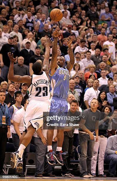 Smith of the Denver Nuggets shoots over Wesley Matthews of the Utah Jazz in Game Six of the Western Conference Quarterfinals of the 2010 NBA Playoffs...