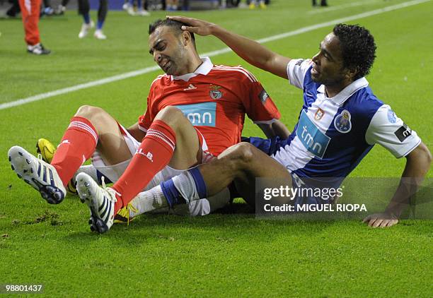 Benfica's midfielder Carlos Martins and FC Porto´s defender from Uruguay Alvaro Pereira are pictured during their Portuguese first league football...