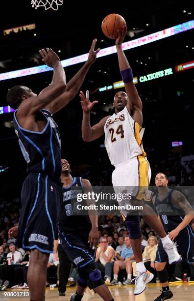 Kobe Bryant of the Los Angeles Lakers shoots over Paul Millsap of the Utah Jazz during Game One of the Western Conference Semifinals of the 2010 NBA...