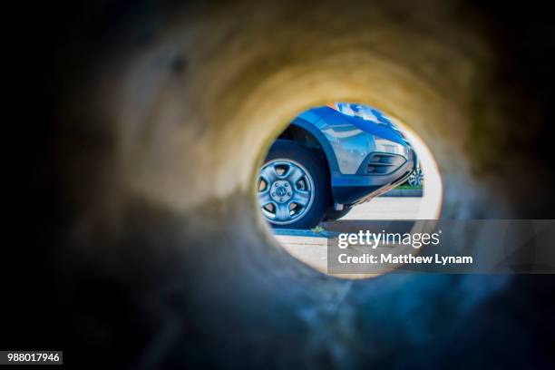 car through an abutment - abutment stock pictures, royalty-free photos & images