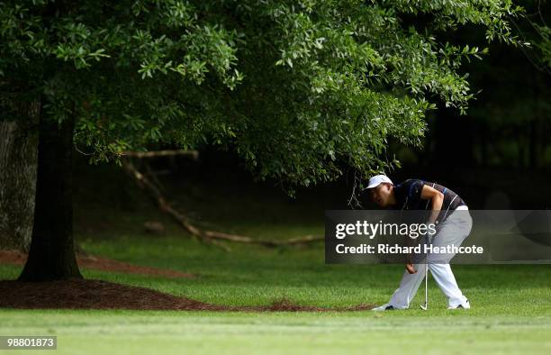 Anthony Kim plays from under a tree on the 12th during the final round of the Quail Hollow Championship at Quail Hollow Country Club on May 2, 2010...