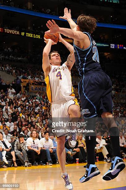 Luke Walton of the Los Angeles Lakers shoots against Kyle Korver of the Utah Jazz in Game One of the Western Conference Semifinals during the 2010...