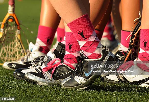 April 30: The South River girl's varsity lacrosse team wear pink socks in support of a teammate's mom who passed away from breast cancer last year.