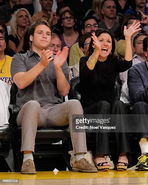 Julia Louis-Dreyfus and her son Henry attends a game between the Utah Jazz and the Los Angeles Lakers at Staples Center on May 2, 2010 in Los...