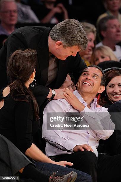 Antonio Villaraigosa talks to Tim Leiweke at a game between the Utah Jazz and the Los Angeles Lakers at Staples Center on May 2, 2010 in Los Angeles,...