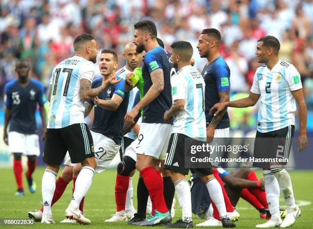 Nicolas Otamendi of Argentina and Olivier Giroud of France clash during the 2018 FIFA World Cup Russia Round of 16 match between France and Argentina...