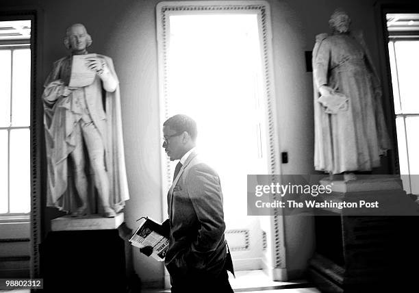 Congresswoman Maxine Waters' Chief of staff Mikael Moore walks to the Speaker's office for meeting during a busy day on Capitol Hill April 27...