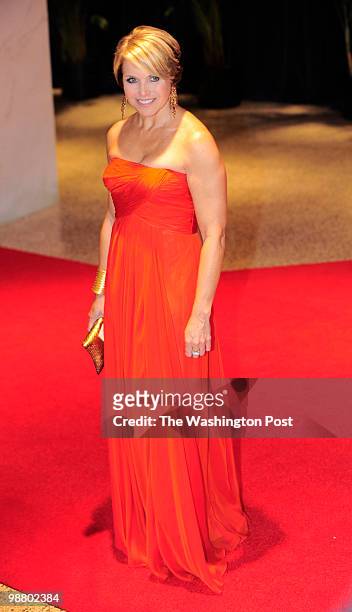 Katie Couric poses for photographers at the annual White House Correspondents Association dinner at the Washington Hilton in Washington, DC on May 1,...
