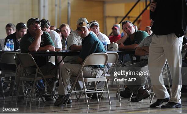 Fishermen attend a safety lecture by BP staff at the Venice school after signing up to combat the spreading oil slick following the BP Deepwater...