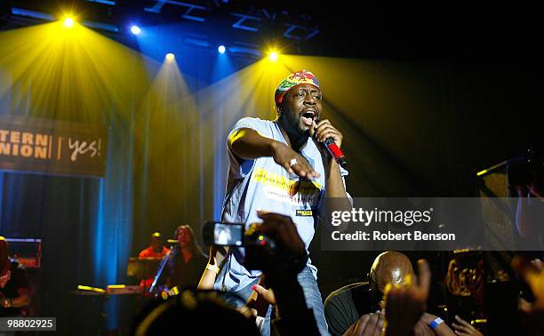 Wyclef Jean performs at Western Union's "Return the Love" campaign and concert to honor moms of the military a week before Mother's Day at Camp...
