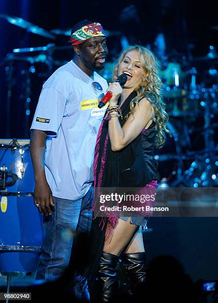 Paulina Rubio and Wyclef Jean perform at Western Union's "Return the Love" campaign and concert to honor moms of the military a week before Mother's...