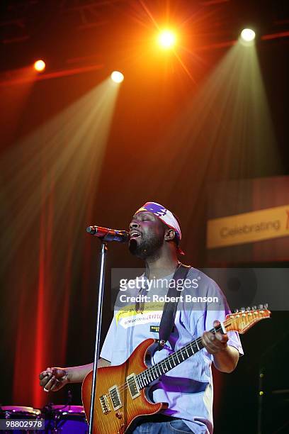Wyclef Jean performs at Western Union's "Return the Love" campaign and concert to honor moms of the military a week before Mother's Day at Camp...