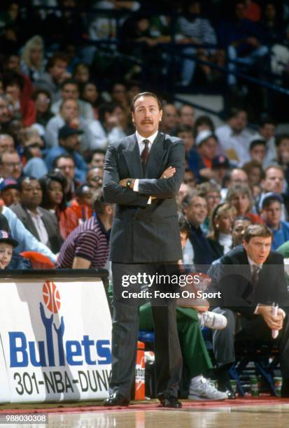 Head coach Chris Ford of the Boston Celtics looks on against the Washington Bullets during an NBA basketball game circa 1991 at the Capital Centre in...