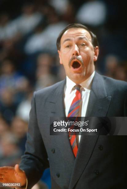 Head coach Chris Ford of the Boston Celtics looks on against the Washington Bullets during an NBA basketball game circa 1992 at the Capital Centre in...