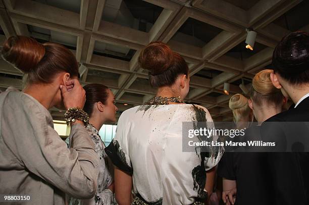 Hair detail is seen as models prepare backstage ahead of the Lisa Ho show on the first day of Rosemount Australian Fashion Week Spring/Summer 2010/11...