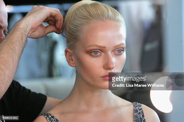 Model prepares backstage ahead of the Lisa Ho show on the first day of Rosemount Australian Fashion Week Spring/Summer 2010/11 off-site at the Art...
