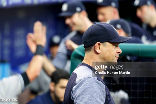 Manager Aaron Boone of the New York Yankees stands in the dugout during a game against the Philadelphia Phillies at Citizens Bank Park on June 26,...