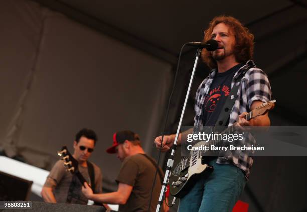 Guitarist Mike McCready, bassist Jeff Ament and singer Eddie Vedder of Pearl Jam perform during Day 6 of the 41st annual New Orleans Jazz & Heritage...