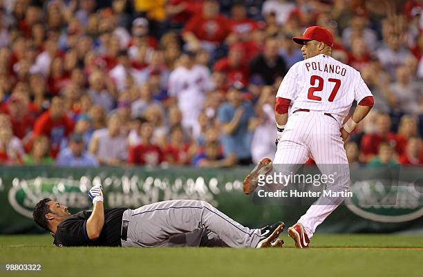 Third baseman Placido Polanco of the Philadelphia Phillies tags out catcher Rod Barajas of the New York Mets during a game at Citizens Bank Park on...