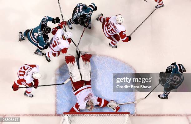 Jimmy Howard of the Detroit Red Wings lies down on the ice to make a save during their game against the San Joses Sharks in Game Two of the Western...