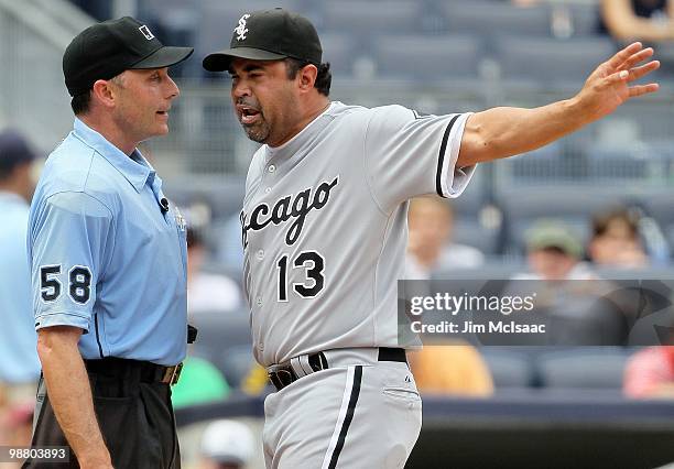 Manager Ozzie Guillen of the Chicago White Sox argues with home plate umpire Dan Iassogna during the game against the New York Yankees on May 2, 2010...