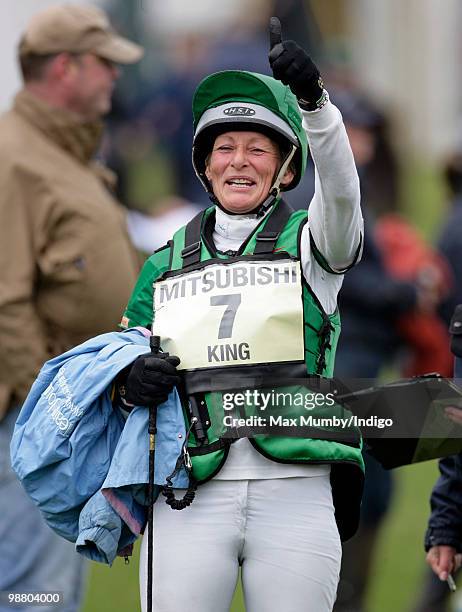 Mary King gives a thumbs-up gesture after competing in the cross country phase of the Badminton Horse Trials on her horse 'Imperial Cavalier' on May...